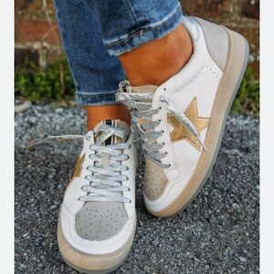 Shu shop star sneaker gold